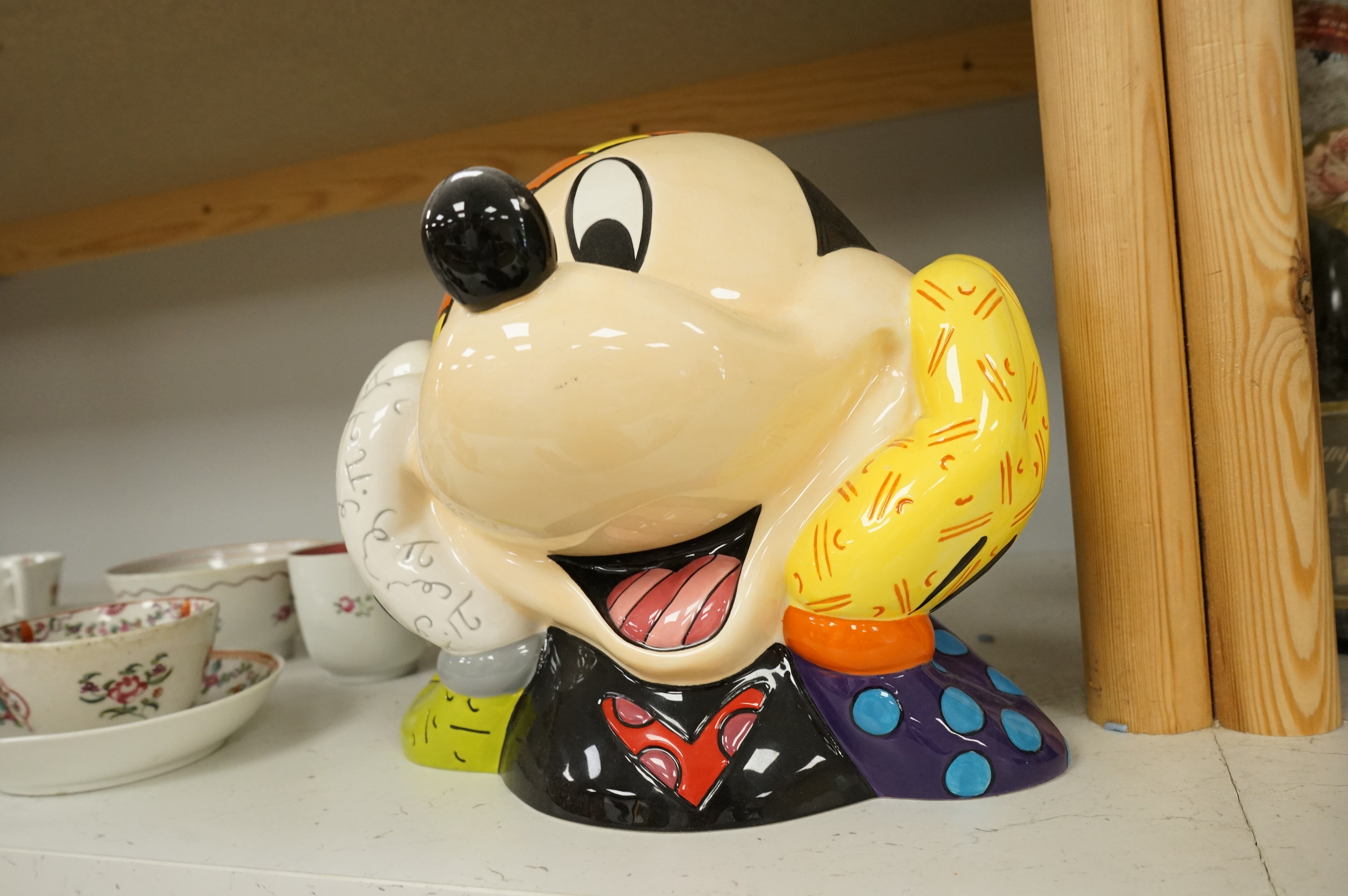 Romero Brotto (Brazilian, 1963-), a ceramic Mickey Mouse cookie jar with booklet, lacking cover, 21cm high